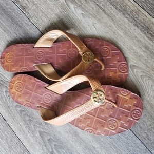 Tory Burch brown and gold flip flops